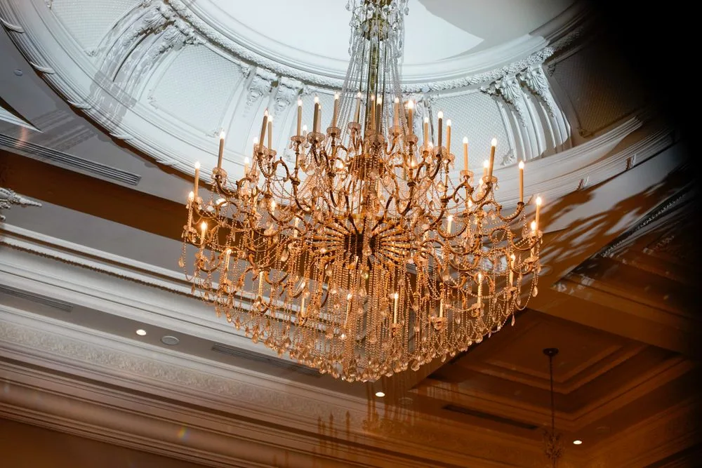 Crystal chandelier in a grand New Jersey wedding-venue ballroom — Maximus Visions