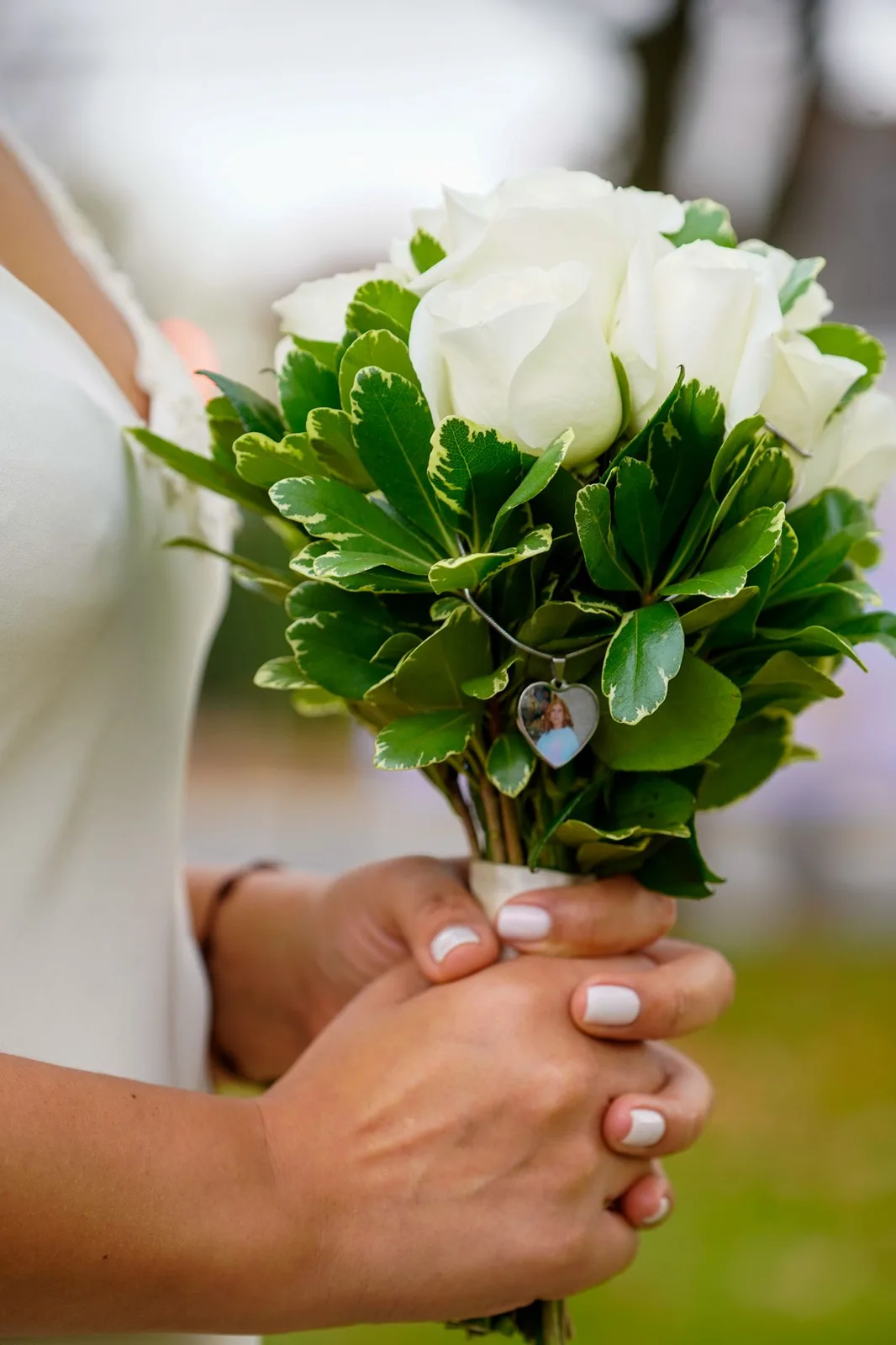 Bride holding a petite white rose bouquet, close-up of her hands — Maximus Visions wedding photography, New Jersey & New York City
