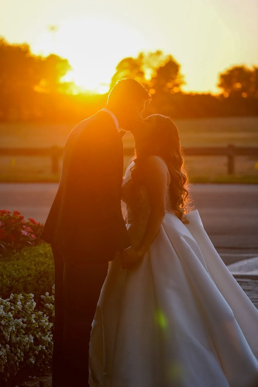 Wedding couple embracing in golden-hour light — Maximus Visions wedding photography, New Jersey & New York City