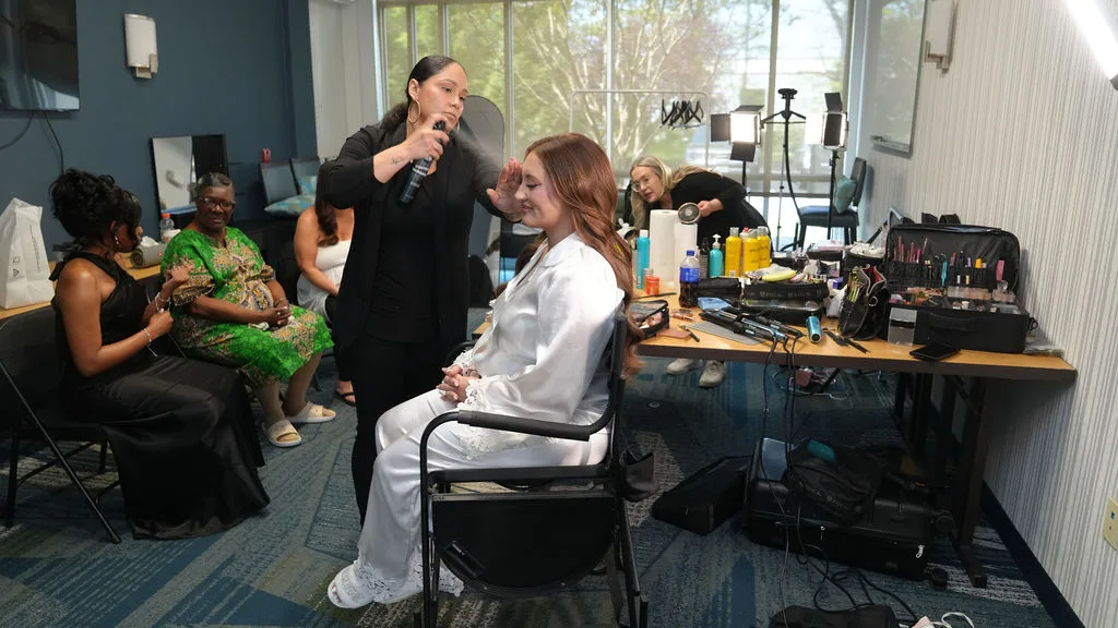 Bridal suite hair and makeup in full swing on the wedding morning, photographed by Maximus Visions, NJ